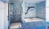 Облицовка стен ванной комнаты мозаикой